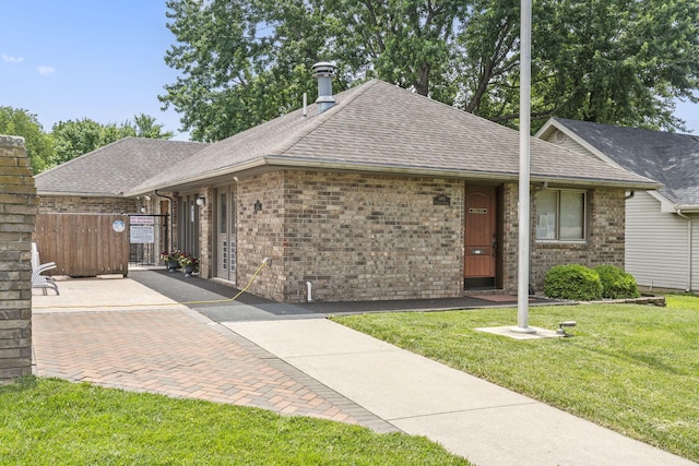 3909 W Eaglecrest St, Battlefield, MO 65619 - ranch-style home with a shingled roof and brick siding