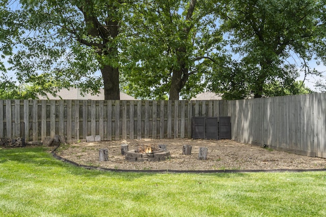 3909 W Eaglecrest St, Battlefield, MO 65619 - view of yard with an outdoor fire pit