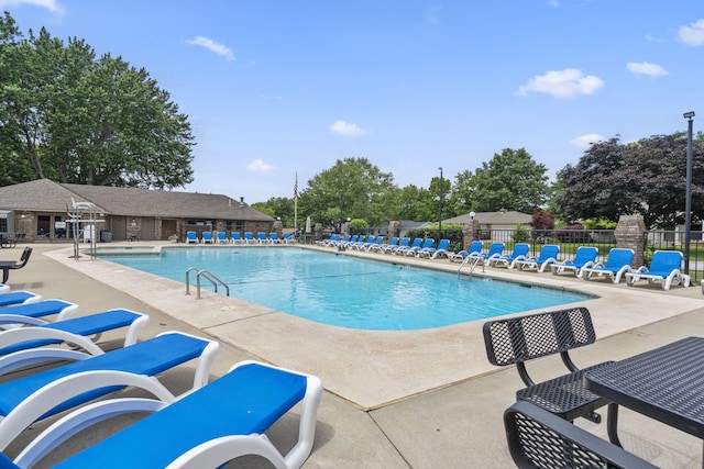 3909 W Eaglecrest St, Battlefield, MO 65619 - community pool featuring a patio area