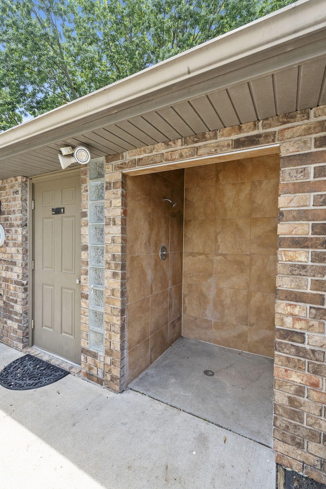 3909 W Eaglecrest St, Battlefield, MO 65619 - doorway to property featuring brick siding
