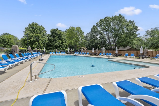 3909 W Eaglecrest St, Battlefield, MO 65619 - community pool featuring a patio area