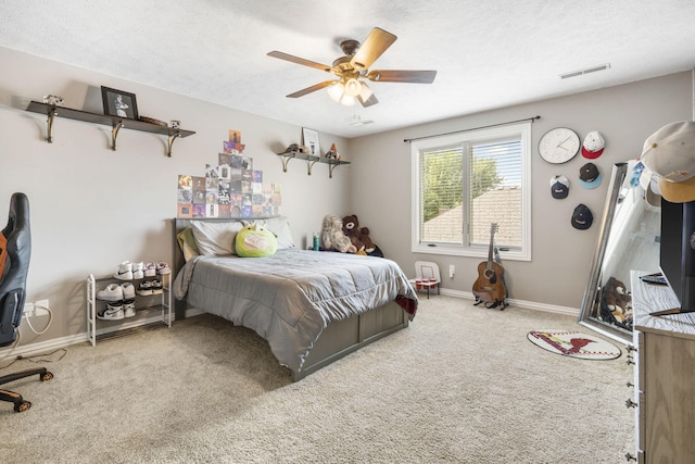 3909 W Eaglecrest St, Battlefield, MO 65619 - carpeted bedroom with baseboards, a ceiling fan, and a textured ceiling