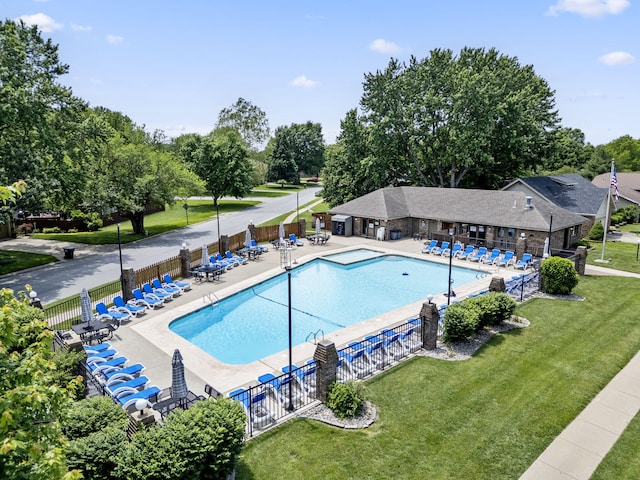 3909 W Eaglecrest St, Battlefield, MO 65619 - community pool with a patio and view of wooded area