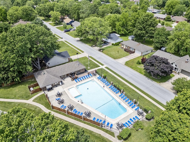 3909 W Eaglecrest St, Battlefield, MO 65619 - bird's eye view of a pool area and a tree filled landscape