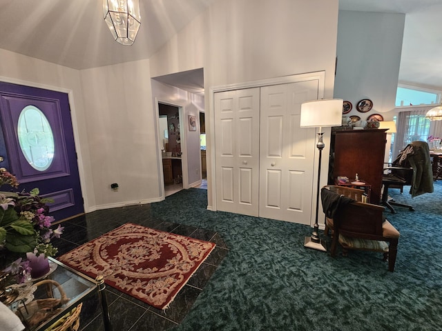 9726 County Road 8530, West Plains, MO 65775 - foyer with a chandelier, a high ceiling, baseboards, and granite floors