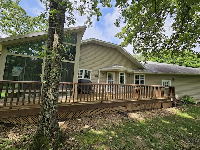 9726 County Road 8530, West Plains, MO 65775 - rear view of house with a sunroom and a wooden deck