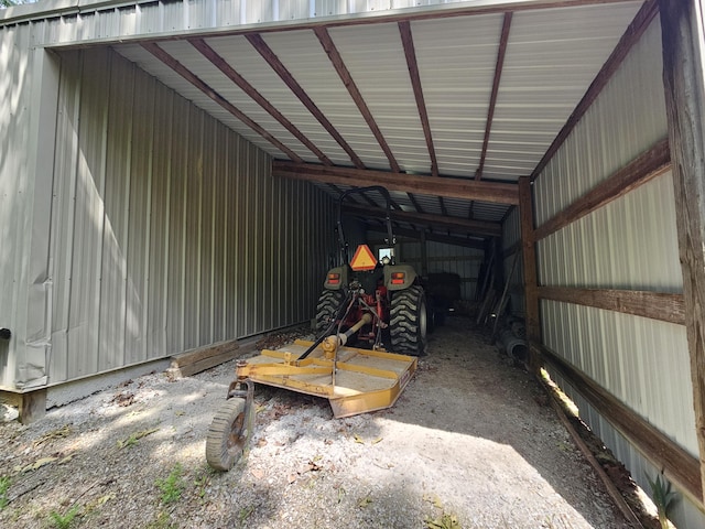 9726 County Road 8530, West Plains, MO 65775 - garage featuring an attached carport