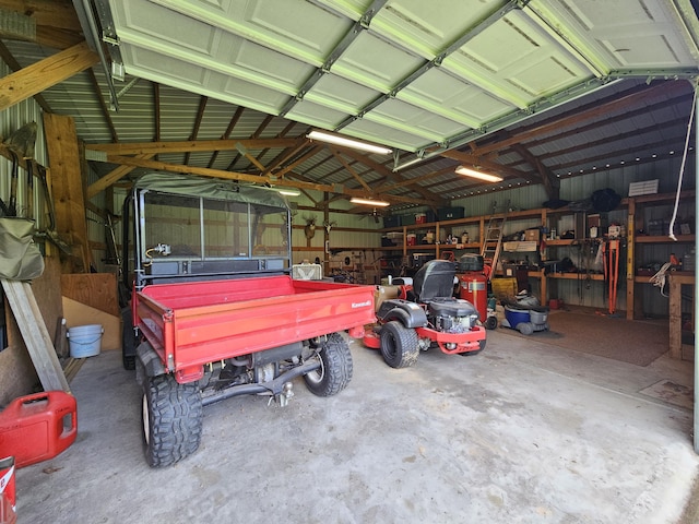 9726 County Road 8530, West Plains, MO 65775 - garage with a workshop area and metal wall