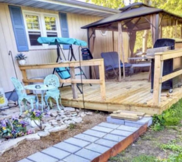 160 Clark St, Taneyville, MO 65759 - wooden deck featuring a gazebo