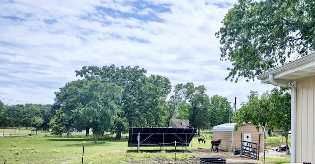 160 Clark St, Taneyville, MO 65759 - view of grassy yard featuring an outdoor structure