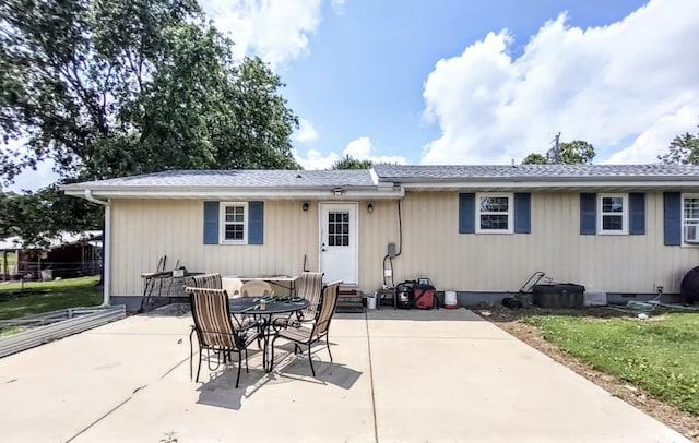 160 Clark St, Taneyville, MO 65759 - rear view of property featuring a patio area, crawl space, entry steps, and outdoor dining space