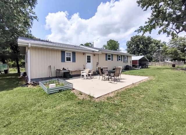 160 Clark St, Taneyville, MO 65759 - back of property featuring a patio and a garden