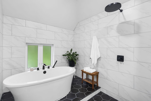 95 Highland Ct, Strafford, MO 65757 - bathroom featuring tile walls, a freestanding tub, and tile patterned flooring