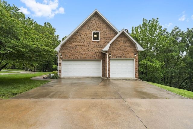 95 Highland Ct, Strafford, MO 65757 - view of home's exterior featuring an attached garage, brick siding, driveway, and a lawn