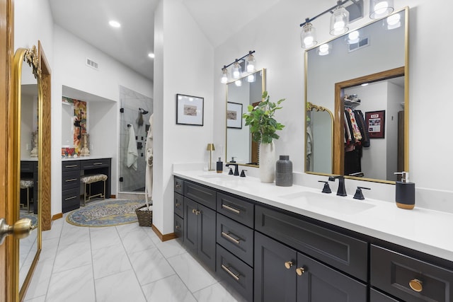 95 Highland Ct, Strafford, MO 65757 - bathroom featuring double vanity, a shower stall, a walk in closet, and marble look tiles