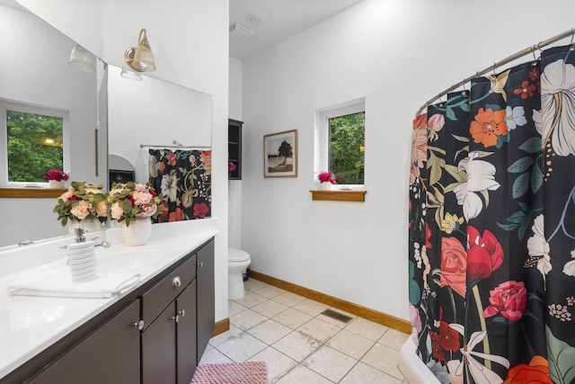 95 Highland Ct, Strafford, MO 65757 - bathroom with vanity, toilet, plenty of natural light, and tile patterned flooring