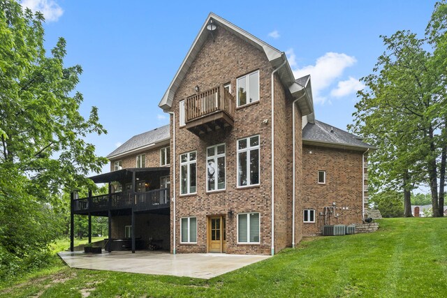 95 Highland Ct, Strafford, MO 65757 - rear view of property featuring a balcony, a patio area, a lawn, brick siding, and central AC