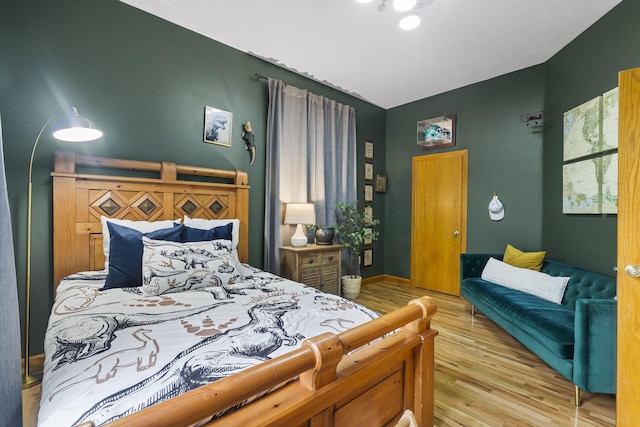 95 Highland Ct, Strafford, MO 65757 - bedroom featuring wood finished floors