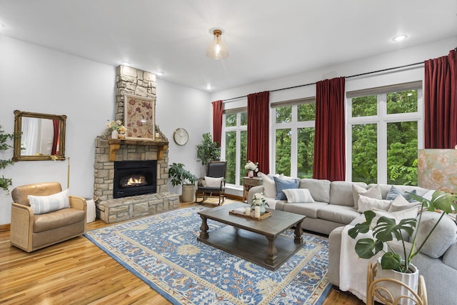 95 Highland Ct, Strafford, MO 65757 - living area featuring wood finished floors, a fireplace, and recessed lighting