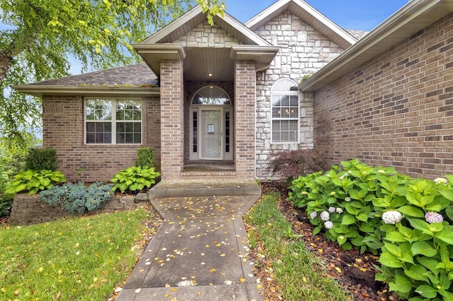 4972 E Cherry Cir, Springfield, MO 65809 - property entrance with brick siding, stone siding, and a shingled roof