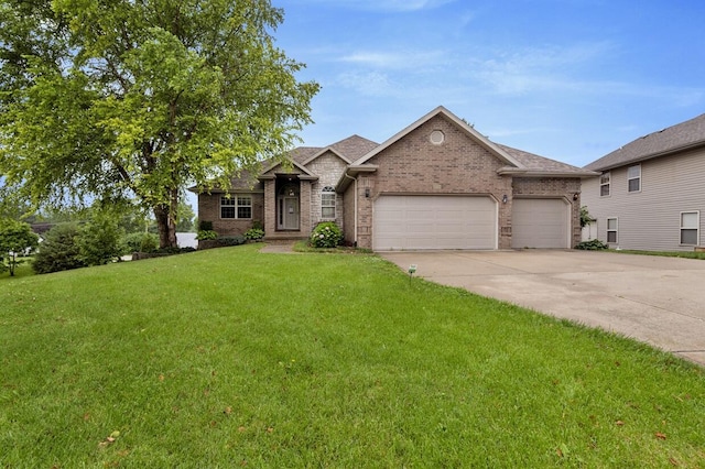 4972 E Cherry Cir, Springfield, MO 65809 - ranch-style home with brick siding, an attached garage, concrete driveway, and a front yard