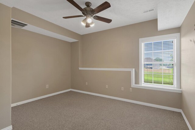 4972 E Cherry Cir, Springfield, MO 65809 - spare room featuring carpet flooring, a ceiling fan, and baseboards