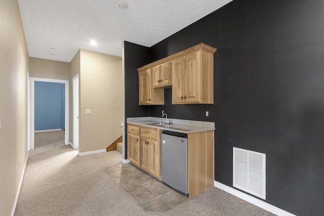 4972 E Cherry Cir, Springfield, MO 65809 - kitchen featuring dishwasher, light brown cabinets, light carpet, baseboards, and light countertops