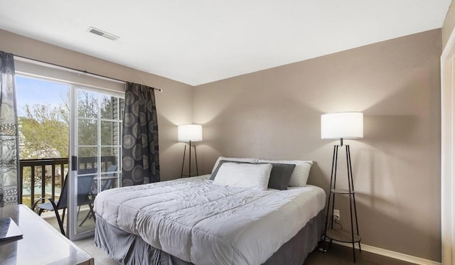 610 Abby Ln Par 61, Branson, MO 65616 - bedroom featuring baseboards and access to exterior