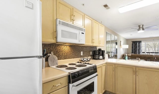 610 Abby Ln Par 61, Branson, MO 65616 - kitchen with white appliances, light brown cabinets, tasteful backsplash, open floor plan, and light countertops