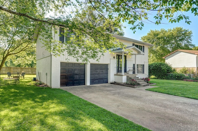 3625 S Moreland Ave, Springfield, MO 65807 - view of front of property featuring brick siding, concrete driveway, and an attached garage