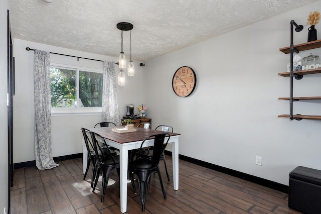 3625 S Moreland Ave, Springfield, MO 65807 - dining room with a textured ceiling, dark wood-style flooring, and baseboards