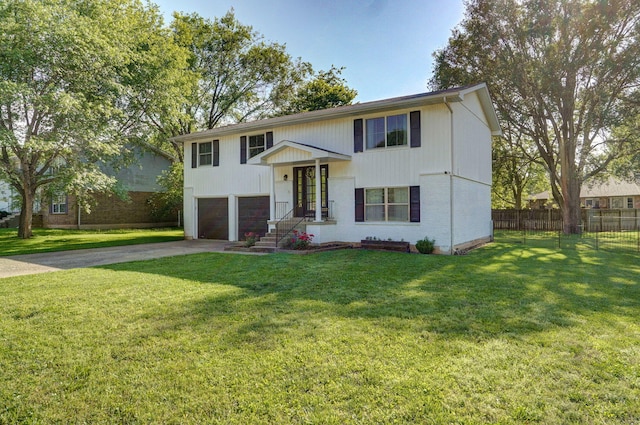 3625 S Moreland Ave, Springfield, MO 65807 - raised ranch featuring an attached garage, concrete driveway, and brick siding