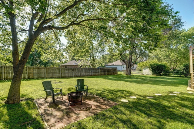 3625 S Moreland Ave, Springfield, MO 65807 - view of yard featuring a patio and an outdoor fire pit