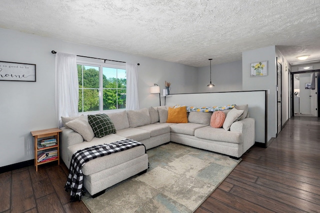 3625 S Moreland Ave, Springfield, MO 65807 - living area featuring hardwood / wood-style floors, a textured ceiling, and baseboards