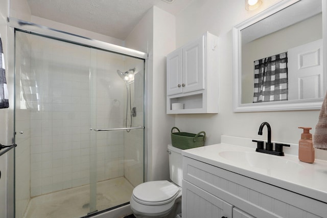 3625 S Moreland Ave, Springfield, MO 65807 - full bath featuring vanity, toilet, a shower stall, and a textured ceiling