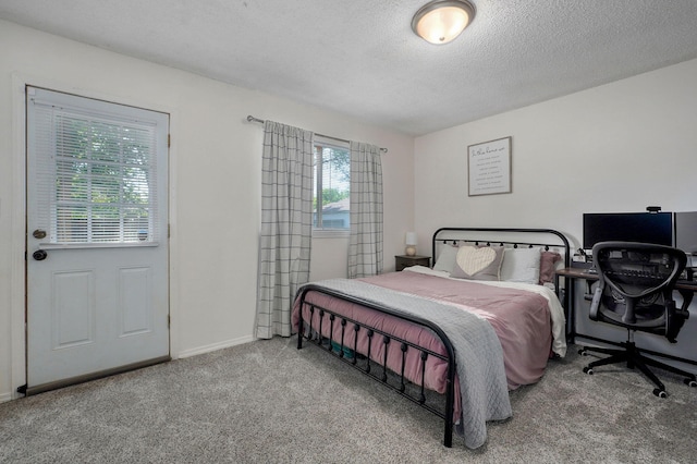 3625 S Moreland Ave, Springfield, MO 65807 - carpeted bedroom with a textured ceiling, baseboards, and an office area
