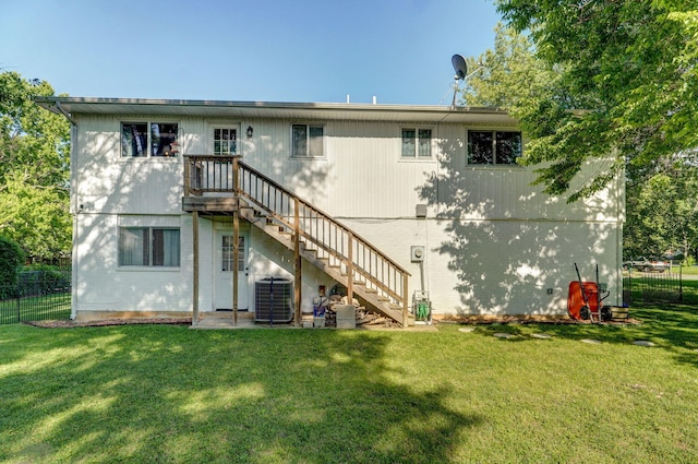 3625 S Moreland Ave, Springfield, MO 65807 - rear view of property featuring stairway and central AC