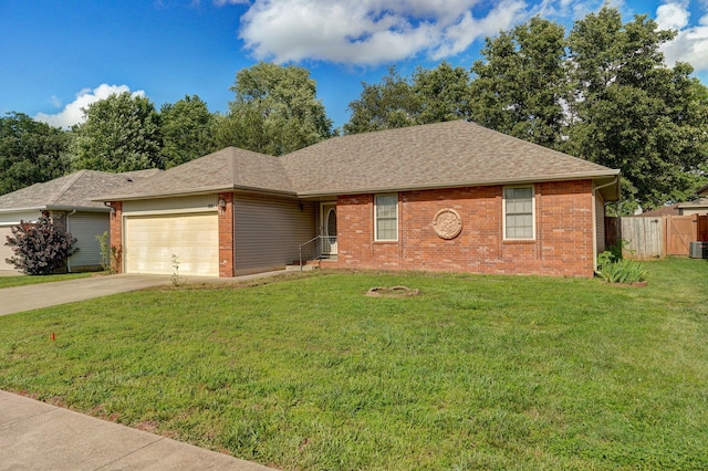 2852 S Pinehurst Ave, Springfield, MO 65807 - ranch-style house with brick siding, concrete driveway, an attached garage, and roof with shingles