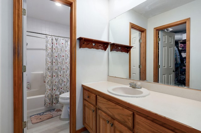 2852 S Pinehurst Ave, Springfield, MO 65807 - full bath with vanity, shower / tub combo, and wood finished floors