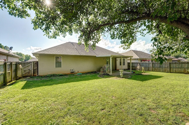2852 S Pinehurst Ave, Springfield, MO 65807 - rear view of property featuring a patio area, a fenced backyard, a gate, and roof with shingles