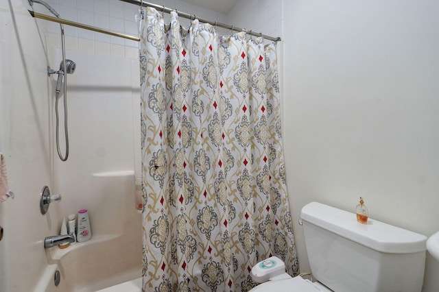 2852 S Pinehurst Ave, Springfield, MO 65807 - bathroom with toilet and shower / bath combo with shower curtain