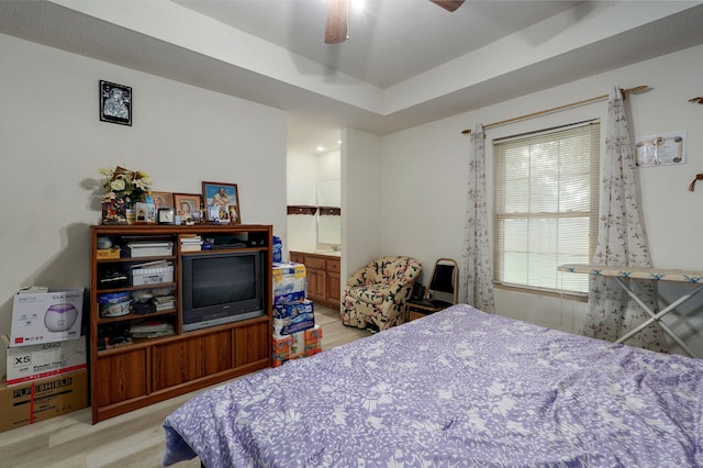 2852 S Pinehurst Ave, Springfield, MO 65807 - bedroom with light wood finished floors, ceiling fan, and ensuite bathroom