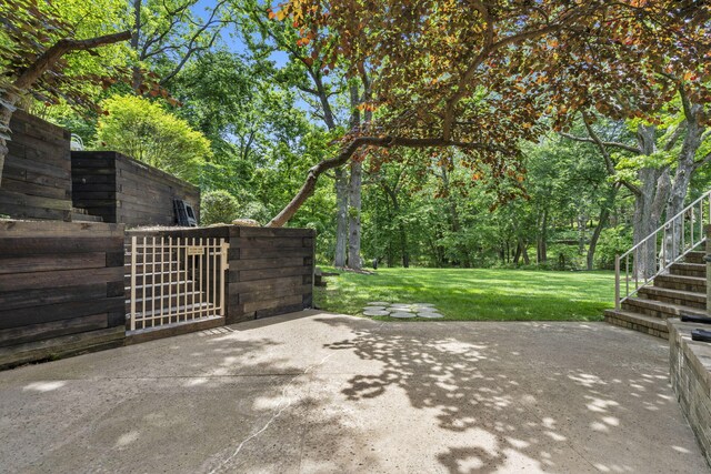 2212 E Nottingham St, Springfield, MO 65804 - view of patio featuring stairs and a gate