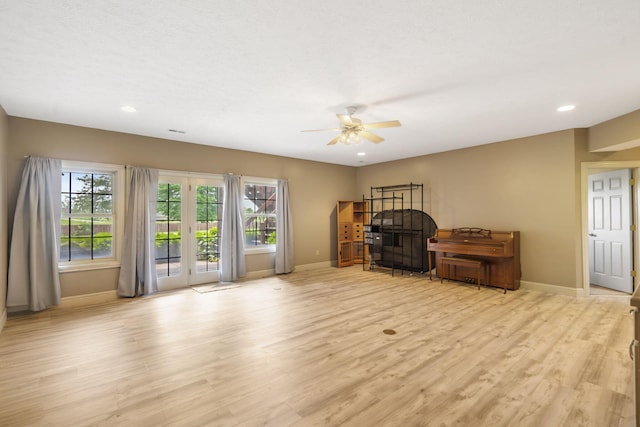 5072 E Hedgerow Dr, Springfield, MO 65802 - living area featuring baseboards, light wood finished floors, ceiling fan, and recessed lighting