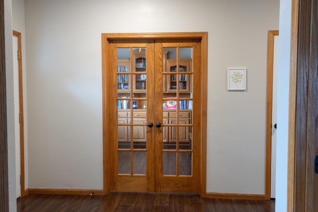1585 S Mission Ave, Bolivar, MO 65613 - detailed view of wood finished floors, french doors, and baseboards