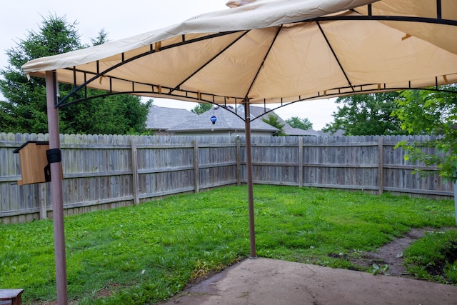 1585 S Mission Ave, Bolivar, MO 65613 - view of yard featuring a gazebo and a patio