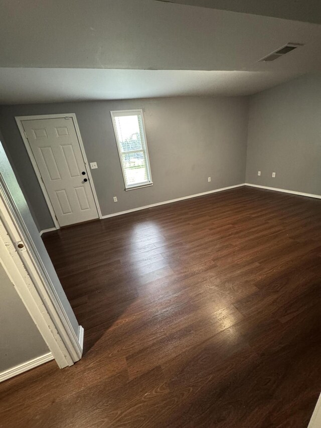 2201 S 14th St, Ozark, MO 65721 - spare room featuring dark wood-style floors and baseboards
