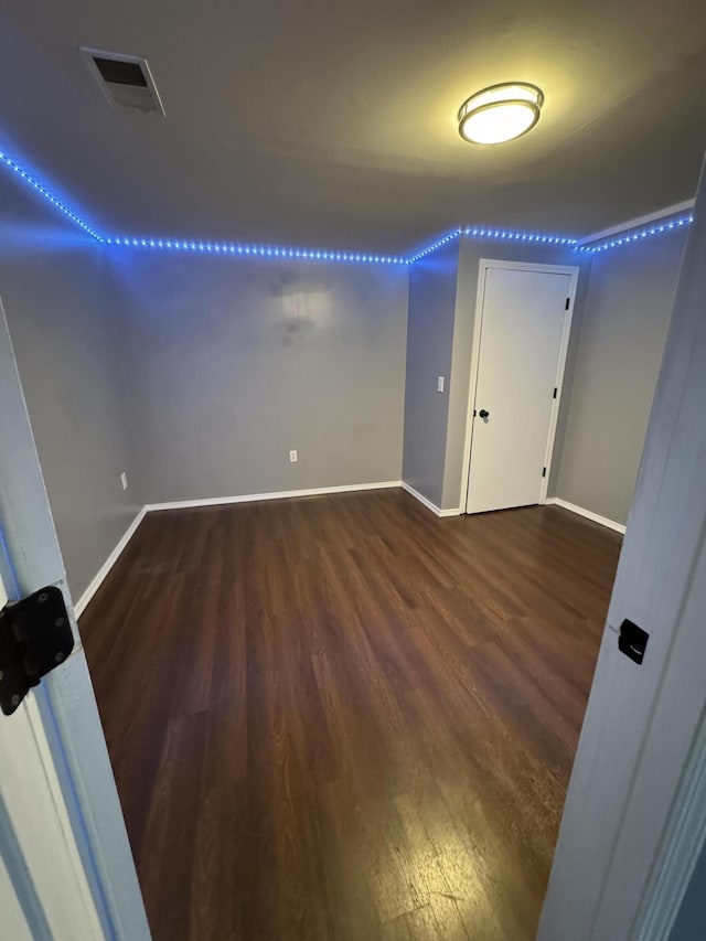 2201 S 14th St, Ozark, MO 65721 - empty room featuring dark wood-style floors and baseboards