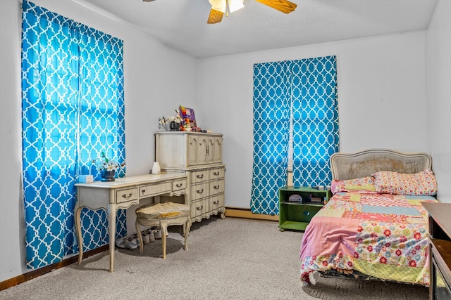 1650 Clouse Rd, Macomb, MO 65702 - carpeted bedroom with ceiling fan and baseboards