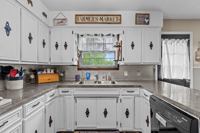 1650 Clouse Rd, Macomb, MO 65702 - kitchen featuring a sink, white cabinets, and decorative backsplash